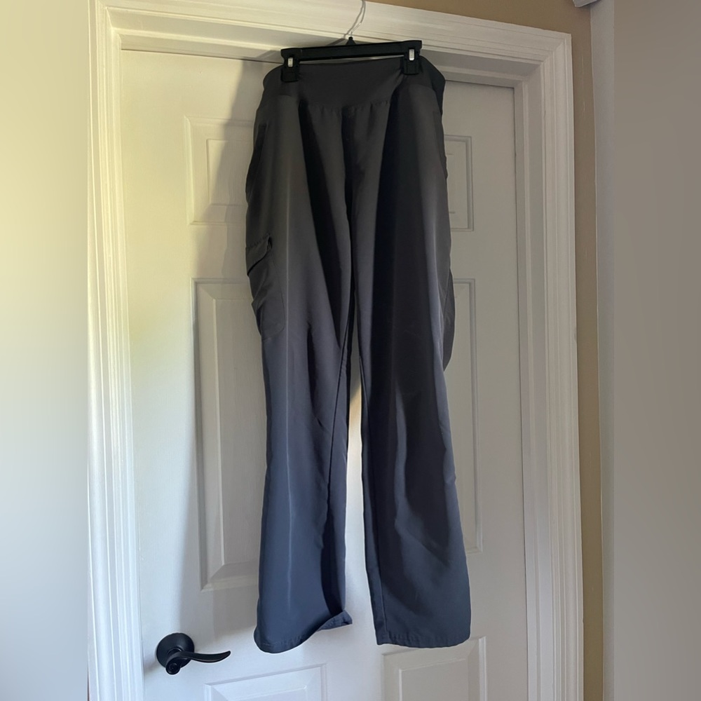 Healing hands scrubs pants with minor pulling/pulls shown in picture.